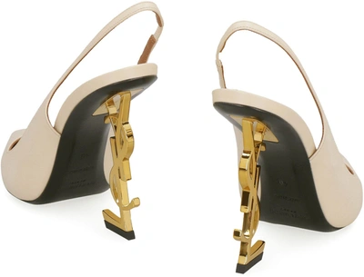 Shop Saint Laurent Opyum Leather Pointy-toe Slingback In Beige