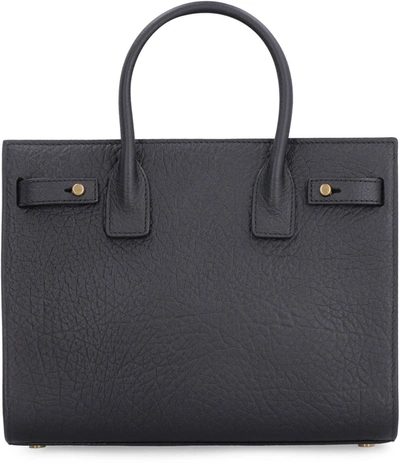 Shop Saint Laurent Sac De Jour Leather Handbag In Black