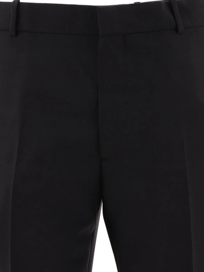 Shop Alexander Mcqueen Selvedge Trousers In Black