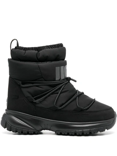 Shop Ugg Yose Puffer Mid Ankle Boots In Black