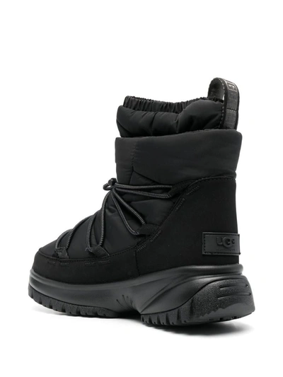 Shop Ugg Yose Puffer Mid Ankle Boots In Black