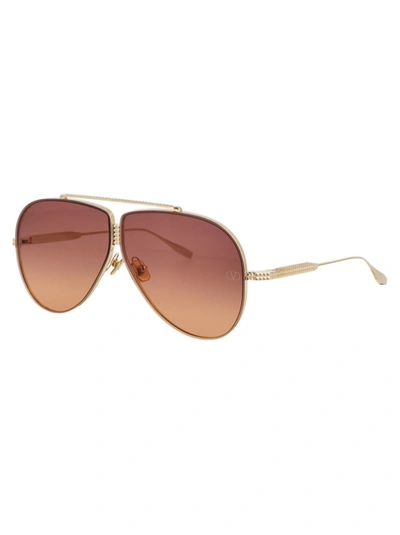 Shop Valentino Garavani Sunglasses In Light Gold W/ Violet To Orange