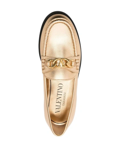Shop Valentino Garavani Vlogo Chain Leather Loafers In Golden