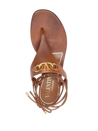 Shop Valentino Garavani Vlogo Chain Leather Thong In Leather Brown