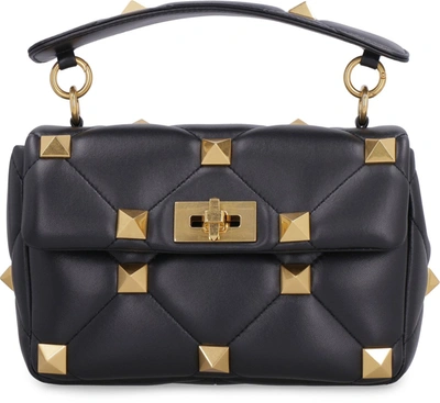 Shop Valentino Garavani - Roman Stud Quilted Leather Bag In Black