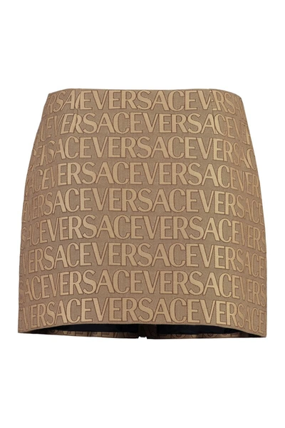 Shop Versace Jacquard Mini Skirt In Beige