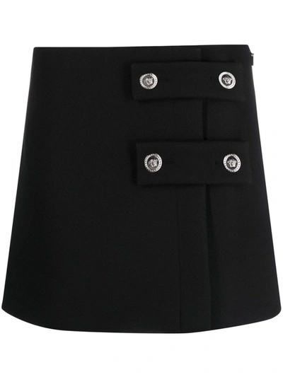 Shop Versace Low-rise Button Skirt In Black