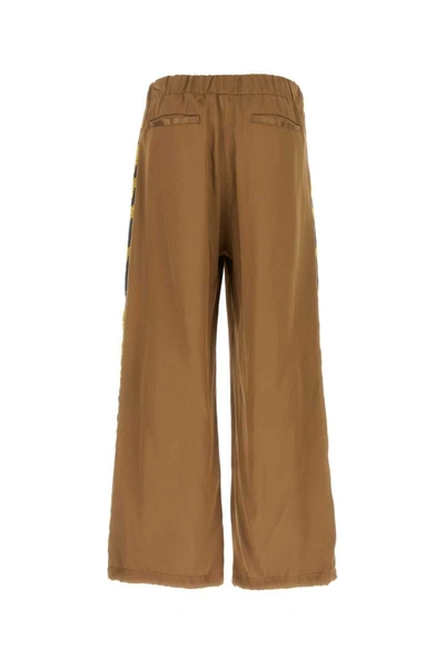 Shop Versace Pants In 5b000