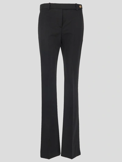 Versace Trousers In <p> Pants In Black Virgin Wool With Gold-toned Medusa  Button And Flared Legs | ModeSens