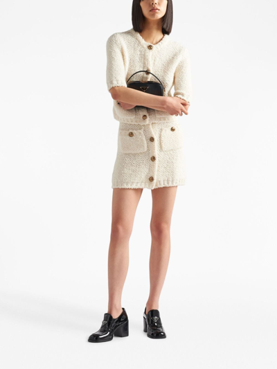 Shop Prada Bouclé Wool Miniskirt In White
