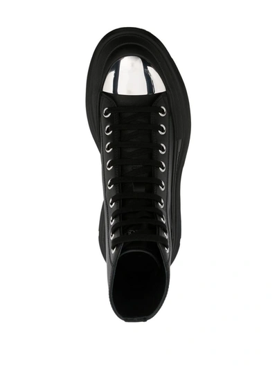 Shop Alexander Mcqueen Tread Slick Leather Ankle Boots In Black