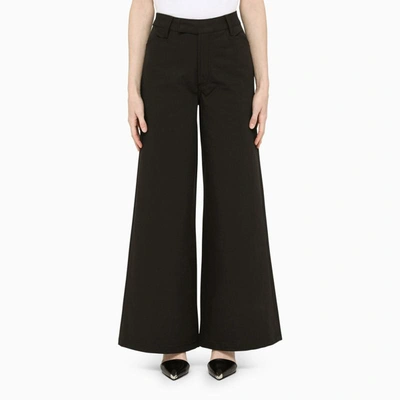 Shop Amiri Wide Trousers In Black