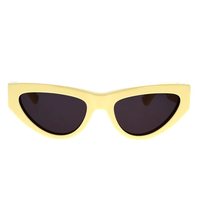 Shop Bottega Veneta Sunglasses In Yellow