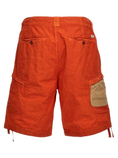 Shop C.p. Company Logo Cargo Badge Bermuda Shorts In Orange