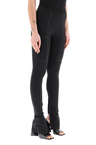 Shop Coperni Zippered Cuff Leggings In Black