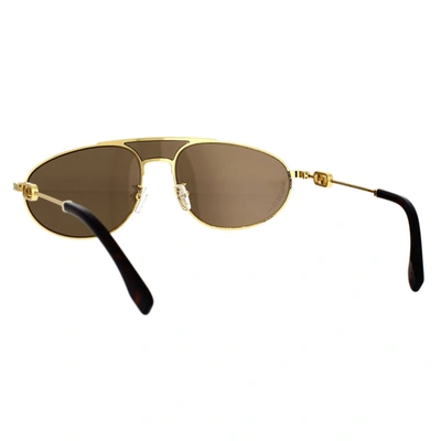 Shop Fendi Sunglasses In Gold