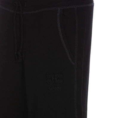Shop Ganni Trousers In Black
