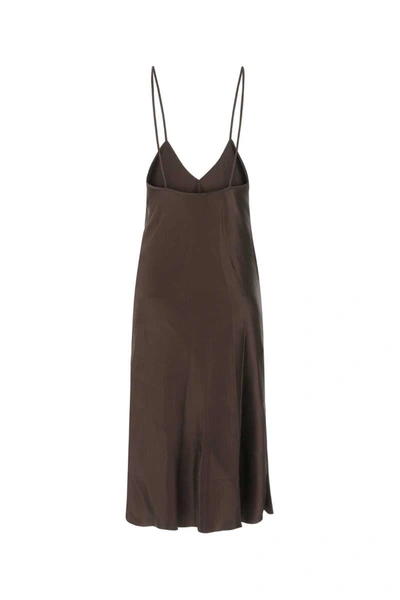 Shop Jil Sander Long Dresses. In Brown