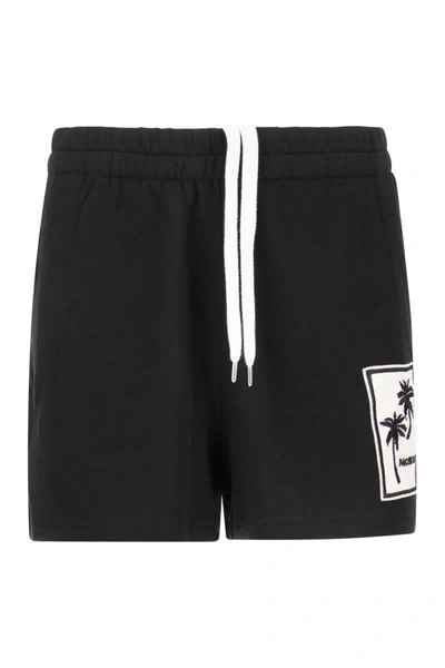 Shop Moncler Shorts With Palm Motif In Black
