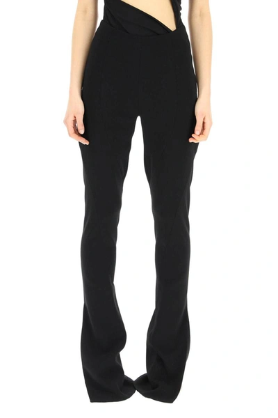 Shop Monot Flared Trousers With Slits In Black