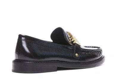 Shop Moschino Flat Shoes In Black