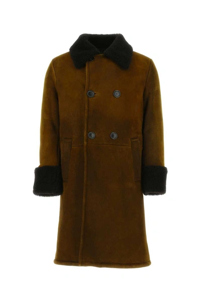 Shop Prada Coats In Brown