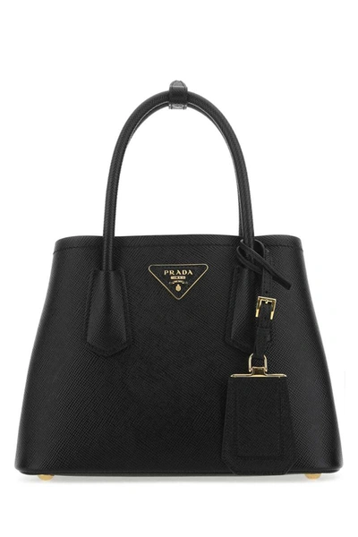 Shop Prada Handbags. In Black