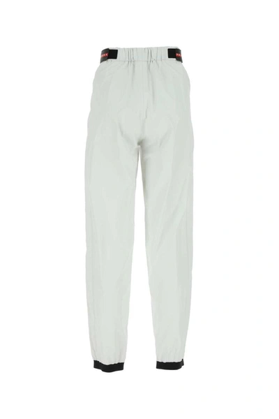Shop Prada Pants In White