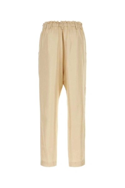 Saint Laurent Trousers With Front Pleats And Back Pockets In Stripped