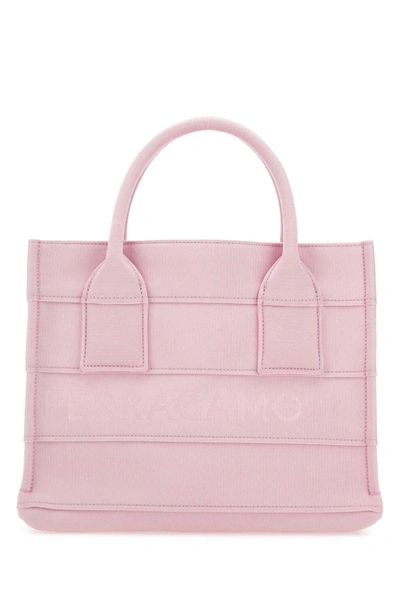 Shop Ferragamo Salvatore  Handbags. In Pink