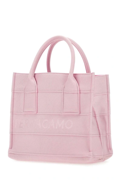 Shop Ferragamo Salvatore  Handbags. In Pink