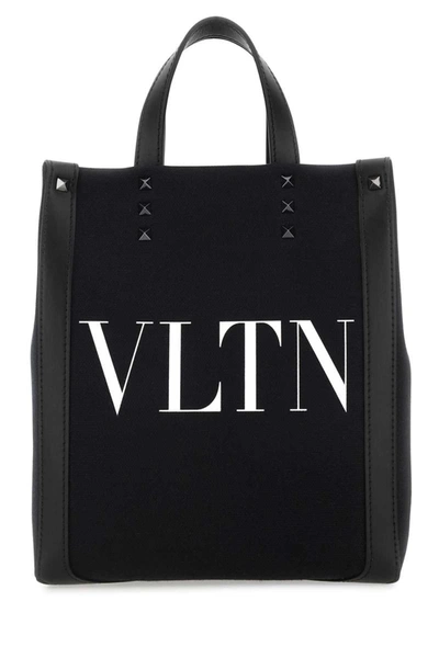 Shop Valentino Garavani Handbags. In Black