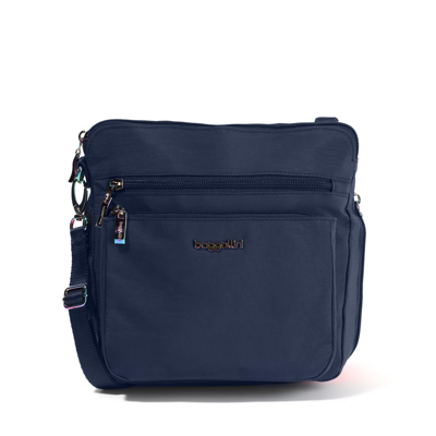 Shop Baggallini Expandable Modern Pocket Crossbody Bag In Blue