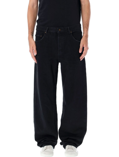 Shop Saint Laurent Long Extreme Baggy Jeans In Black