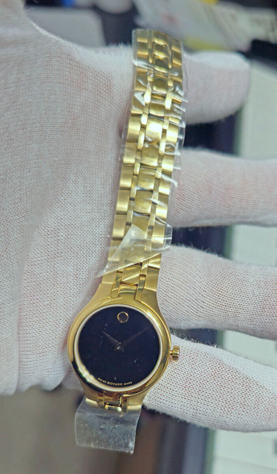 Pre-owned Movado Collection Ladies Watch Black Dial Gold Hands,14k Goldcase & Bracelet