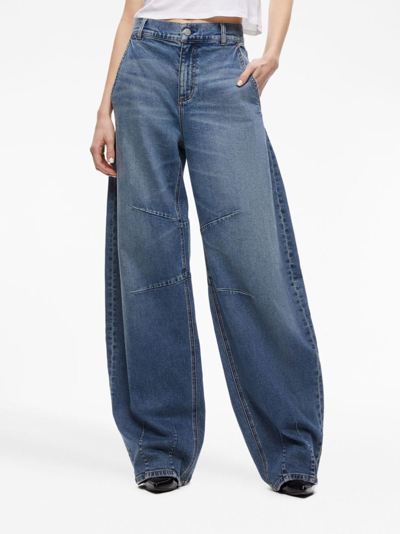 Shop Alice And Olivia Parker Low-rise Flared Jeans In Blue