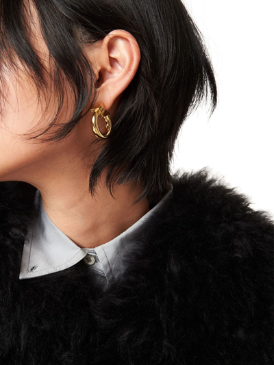 Shop Miu Miu Logo-engraved Hoop Earrings In Gold