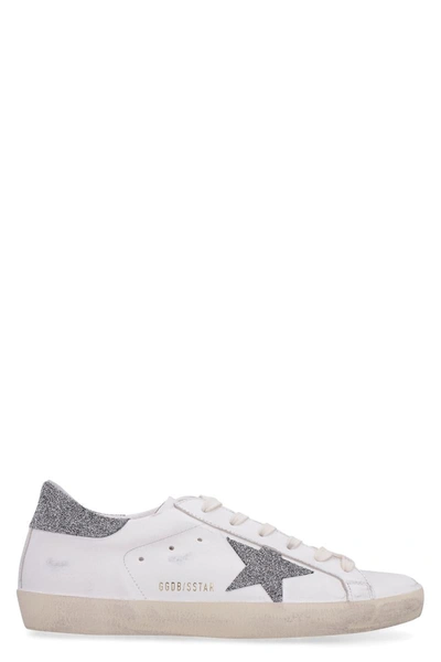 Shop Golden Goose Sneakers In White/silver