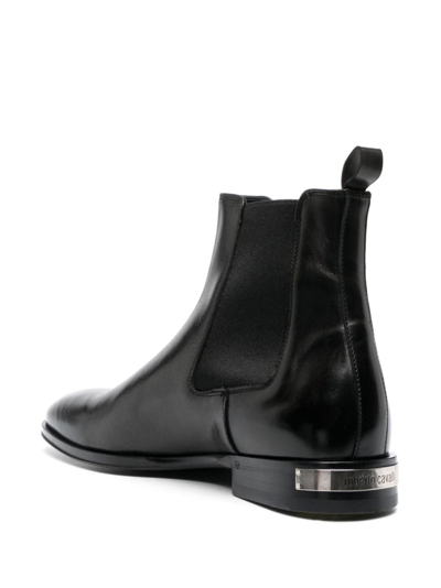 Shop Roberto Cavalli Engraved-logo Leather Boots In Black