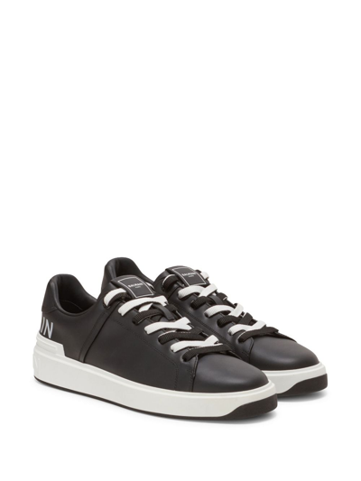 Shop Balmain B-court Leather Sneakers In Black