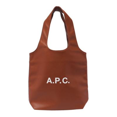 Shop Apc A.p.c. Logo Printed Medium Tote Bag In Brown