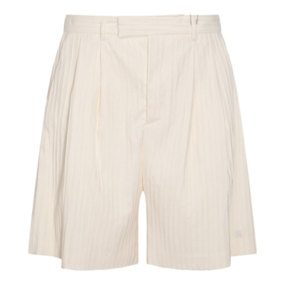 Shop Amiri Pleated Flared Shorts In White