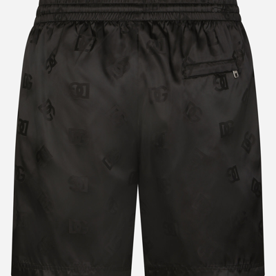 Shop Dolce & Gabbana Mid-length Swim Trunks With Jacquard Dg Monogram In Black