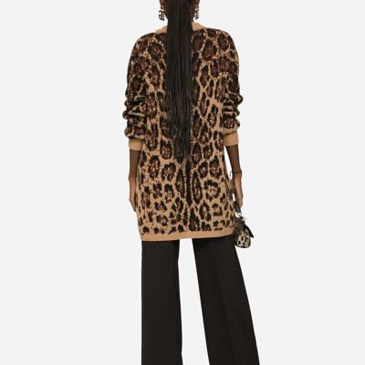 Dolce & Gabbana Flared Wool Pants With Logo Tag In Black