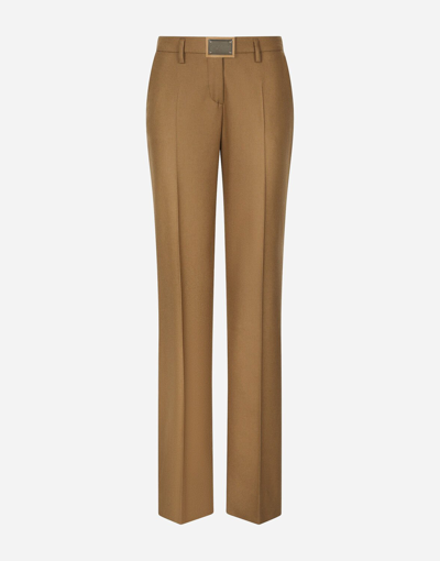 Shop Dolce & Gabbana Flared Flannel Pants With Logo Tag In Beige
