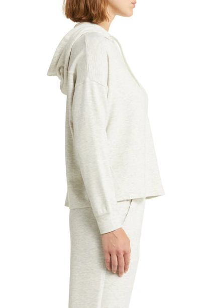 Shop Barefoot Dreams Butter Fleece Hoodie In He Cream