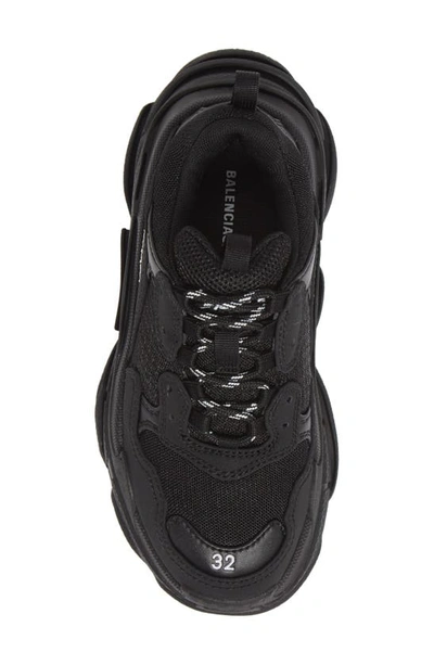 Shop Balenciaga Triple S Sneaker In Black