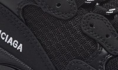 Shop Balenciaga Triple S Sneaker In Black