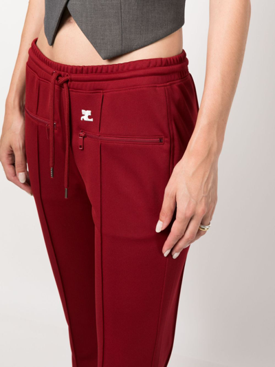 Shop Courrèges Interlock Bootcut Track Pants In Rot