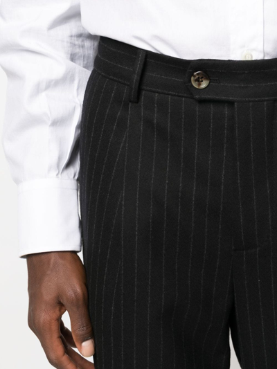 Brunello Cucinelli Pinstripe-pattern Virgin-wool Trousers In Schwarz